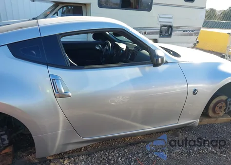 2011 Nissan 370Z Touring z USA, uszkodzony, nr VIN JN1AZ4EH0BM555433